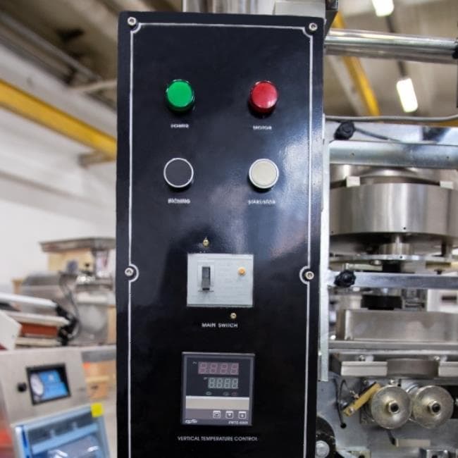 Автомат для упаковки сыпучих продуктов Hualian Machinery DXDK-150II
