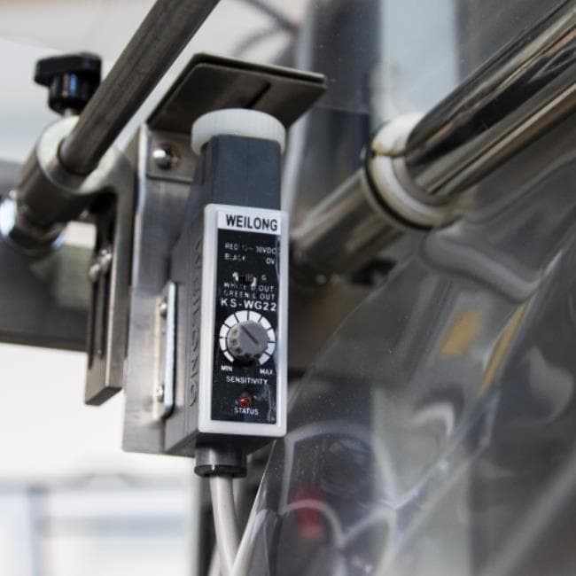Машина для упаковки трудно-сыпучих продуктов и порошков Hualian Machinery DXDF-500A